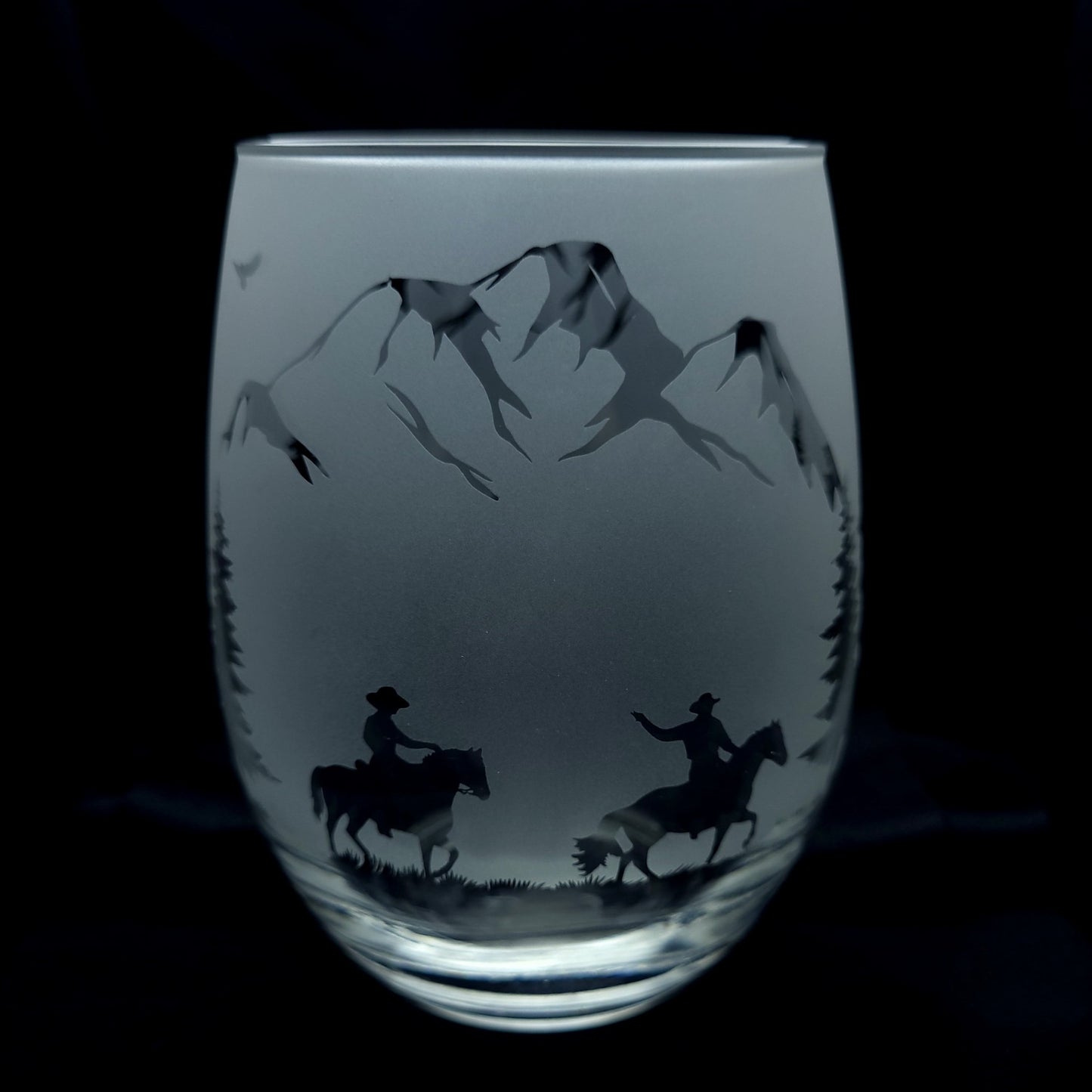 western cowboy themed etched glass, cowboys riding through the mountains on horseback