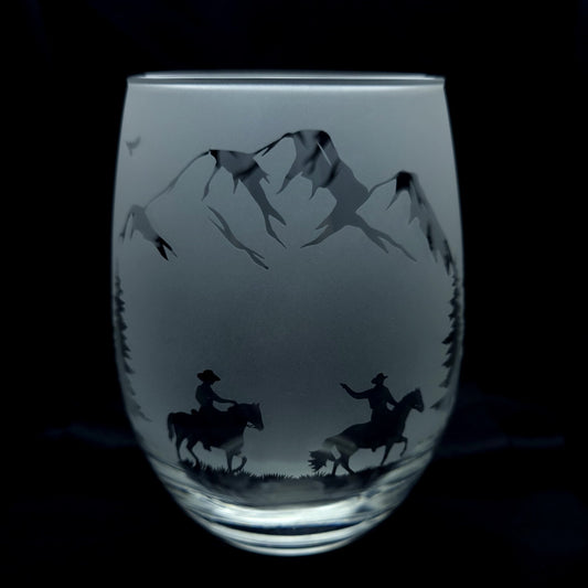 western cowboy themed etched glass, cowboys riding through the mountains on horseback